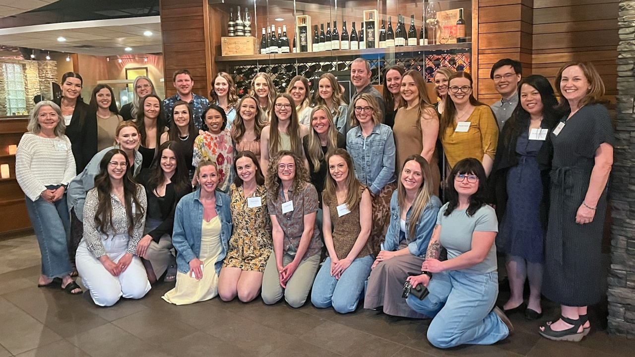 Group photo of attendee's of a class reunion.