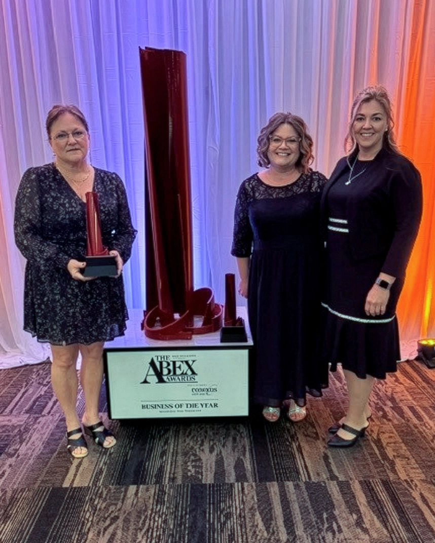 Shari Laventure, Dr. Michelle Pavloff, and Cynthia Beck holding the ABEX Non-Profit Impact Award for SaskAgMatters.